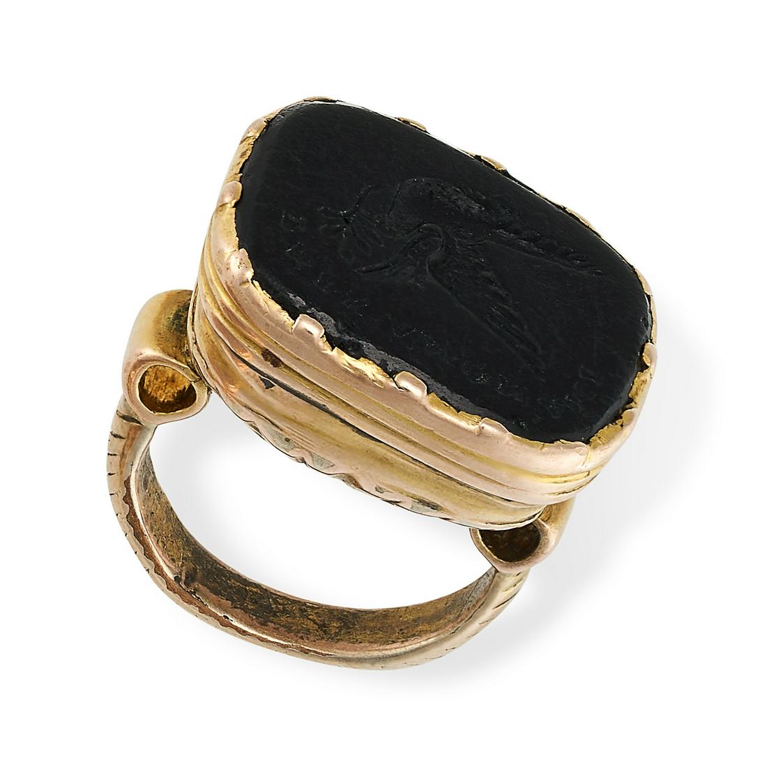 AN ANTIQUE ONYX INTAGLIO SEAL FOB PENDANT set with an onyx intaglio engraved with a dove and the (1 of 1)