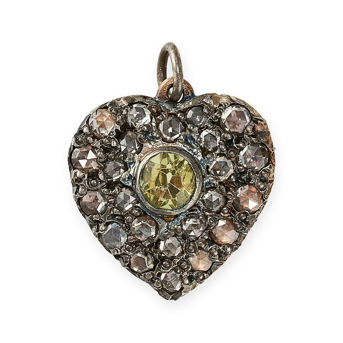 AN ANTIQUE PERIDOT AND DIAMOND HEART PENDANT in yellow gold, set with a round cut peridot on a (1 of 1)