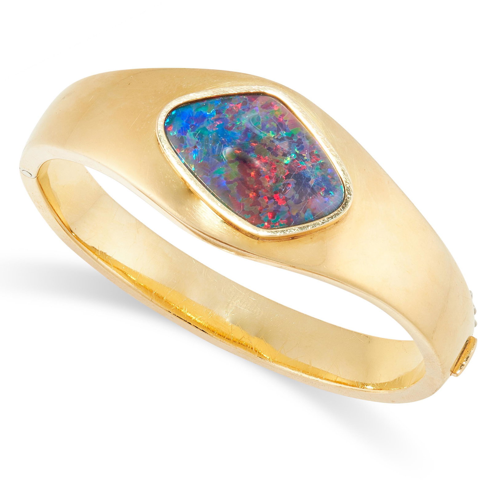 A BLACK OPAL TRIPLET BANGLE in 18ct yellow gold, the hinged bangle set with a black opal triplet, (1 of 1)