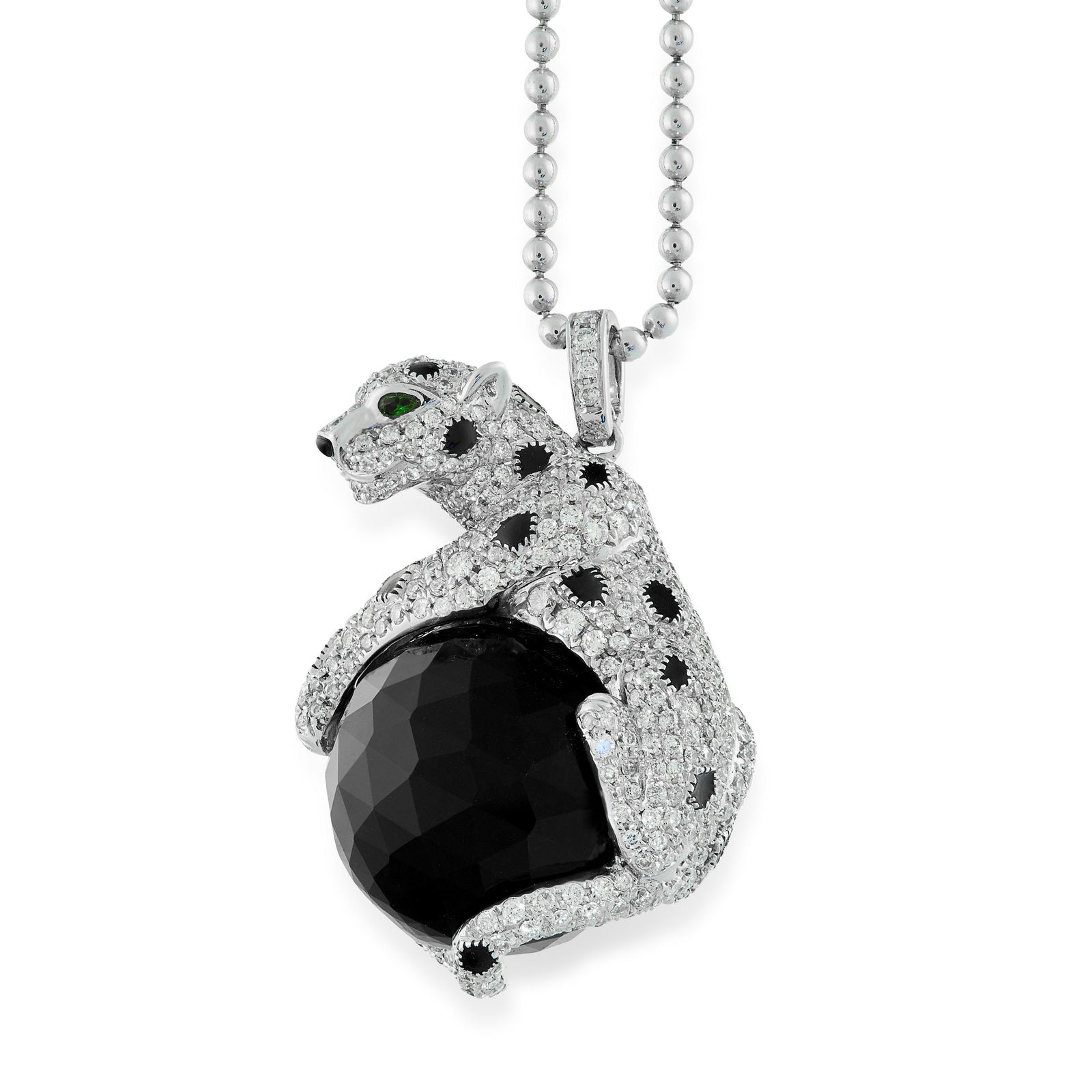 A DIAMOND, EMERALD AND ONYX PANTHER PENDANT NECKLACE in 18ct white gold, the panther set with rou... (1 of 2)