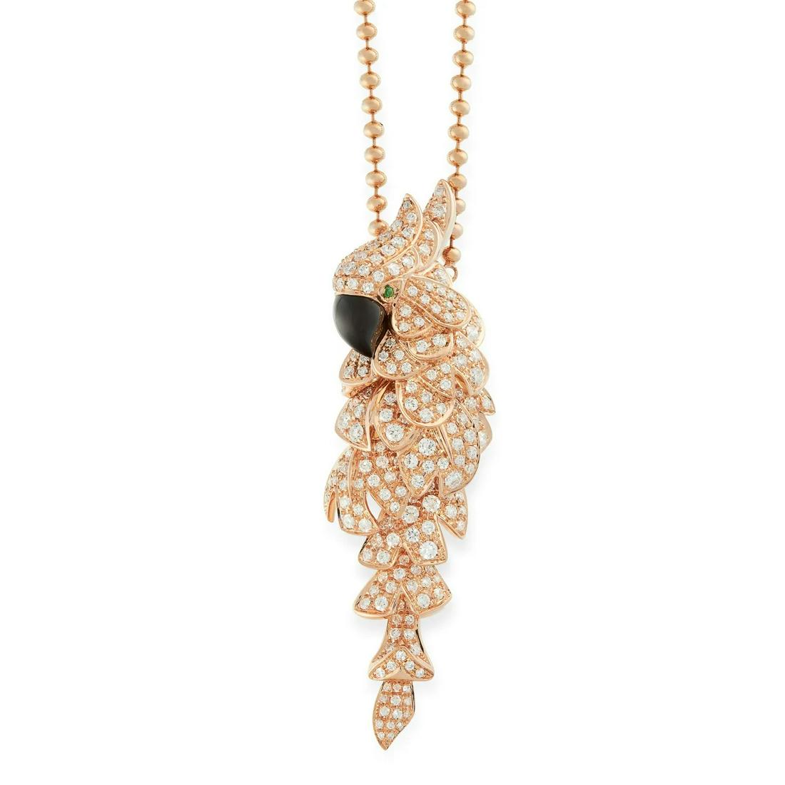AN ONYX, DIAMOND AND EMERALD BIRD PENDANT NECKLACE in 18ct rose gold, designed as a bird, set with (1 of 1)