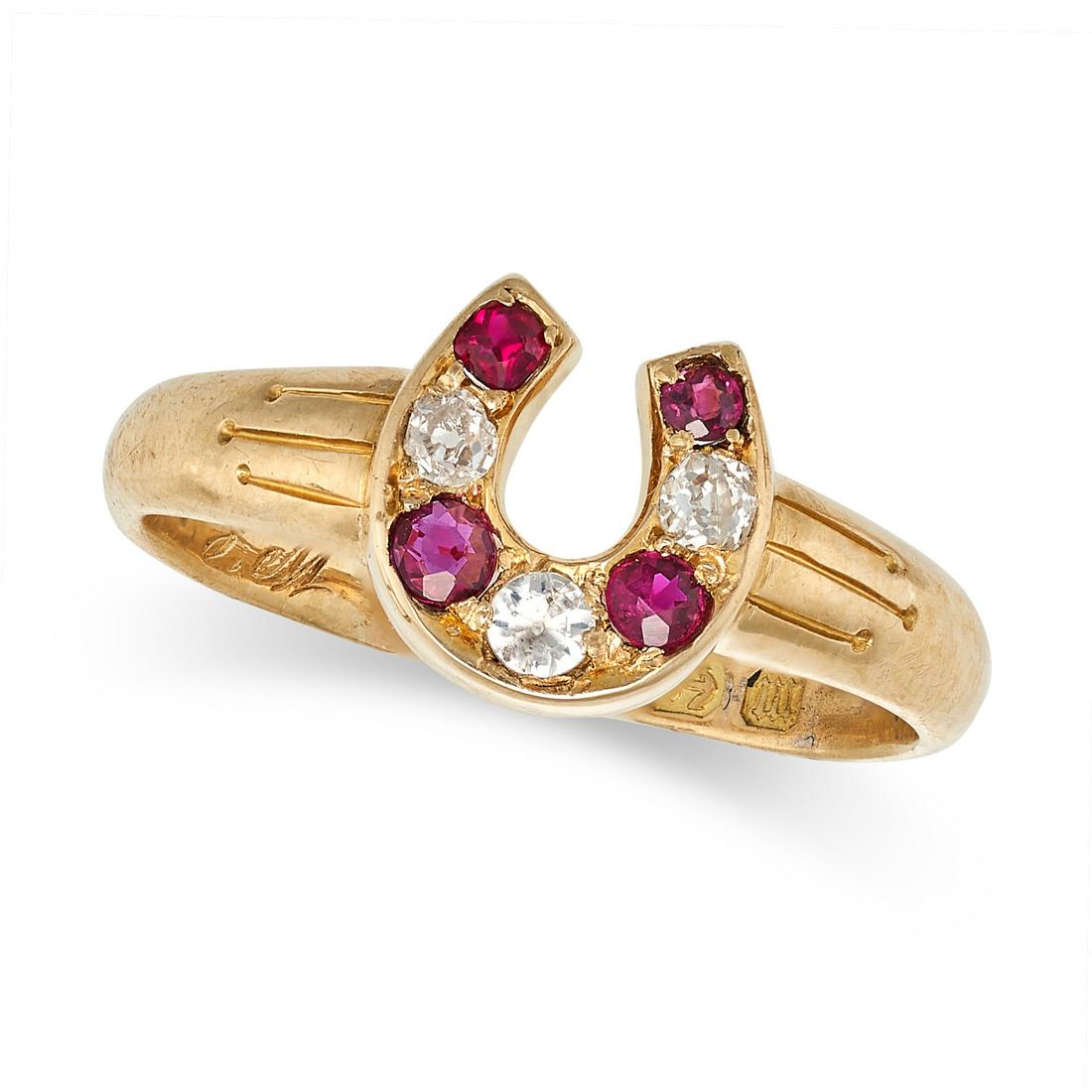 AN ANTIQUE RUBY AND DIAMOND HORSESHOE RING in 18ct yellow gold, designed as a horseshoe set with (1 of 1)