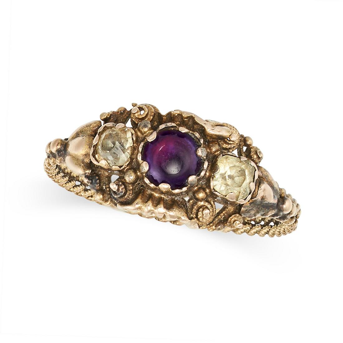 AN ANTIQUE GEORGIAN AMETHYST AND CHRYSOLITE RING in yellow gold, set with a cabochon amethyst (1 of 2)