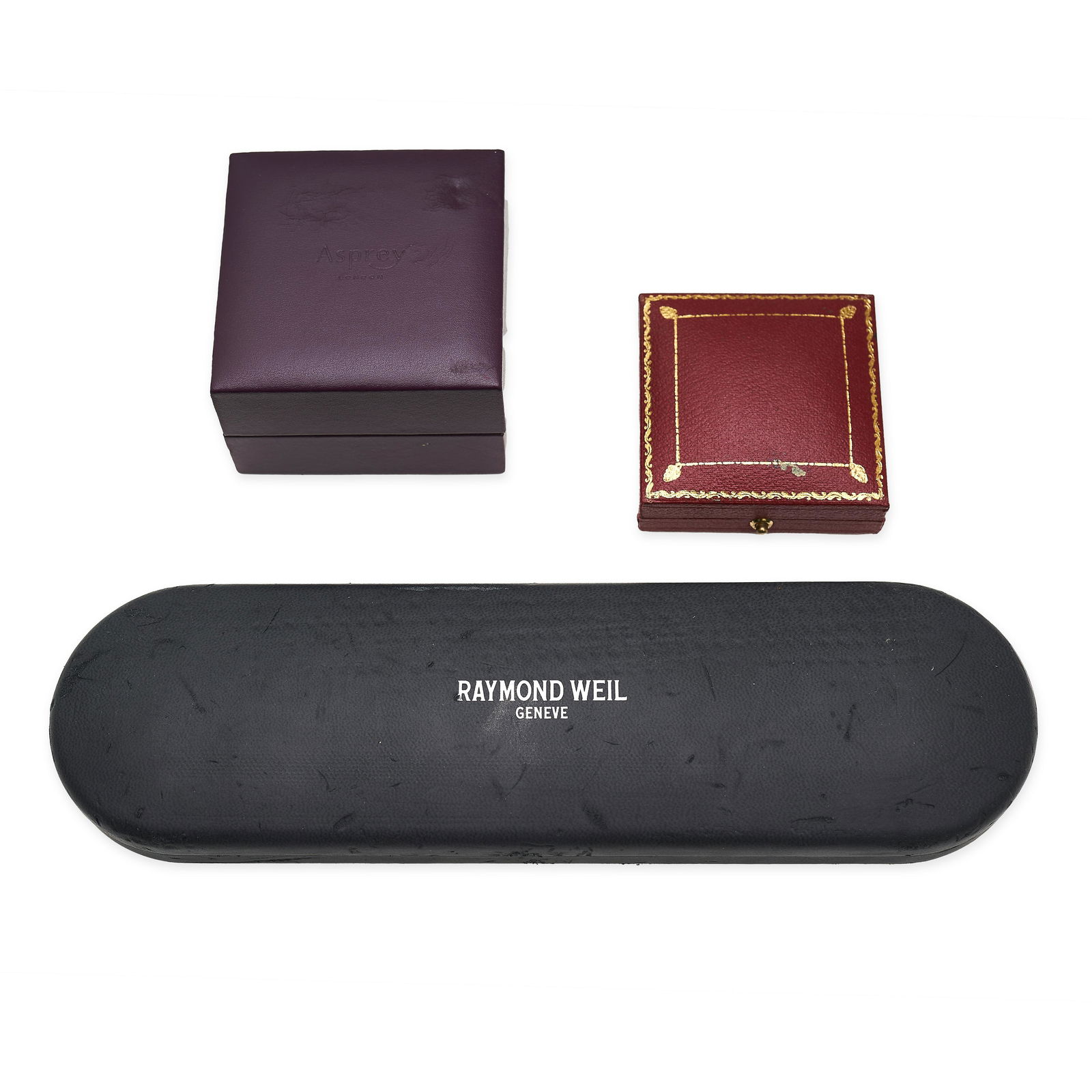 A COLLECTION OF SIGNED JEWELLERY BOXES including two Asprey boxes and a Raymond Weil box.: A COLLECTION OF SIGNED JEWELLERY BOXES including two Asprey boxes and a Raymond Weil box.
