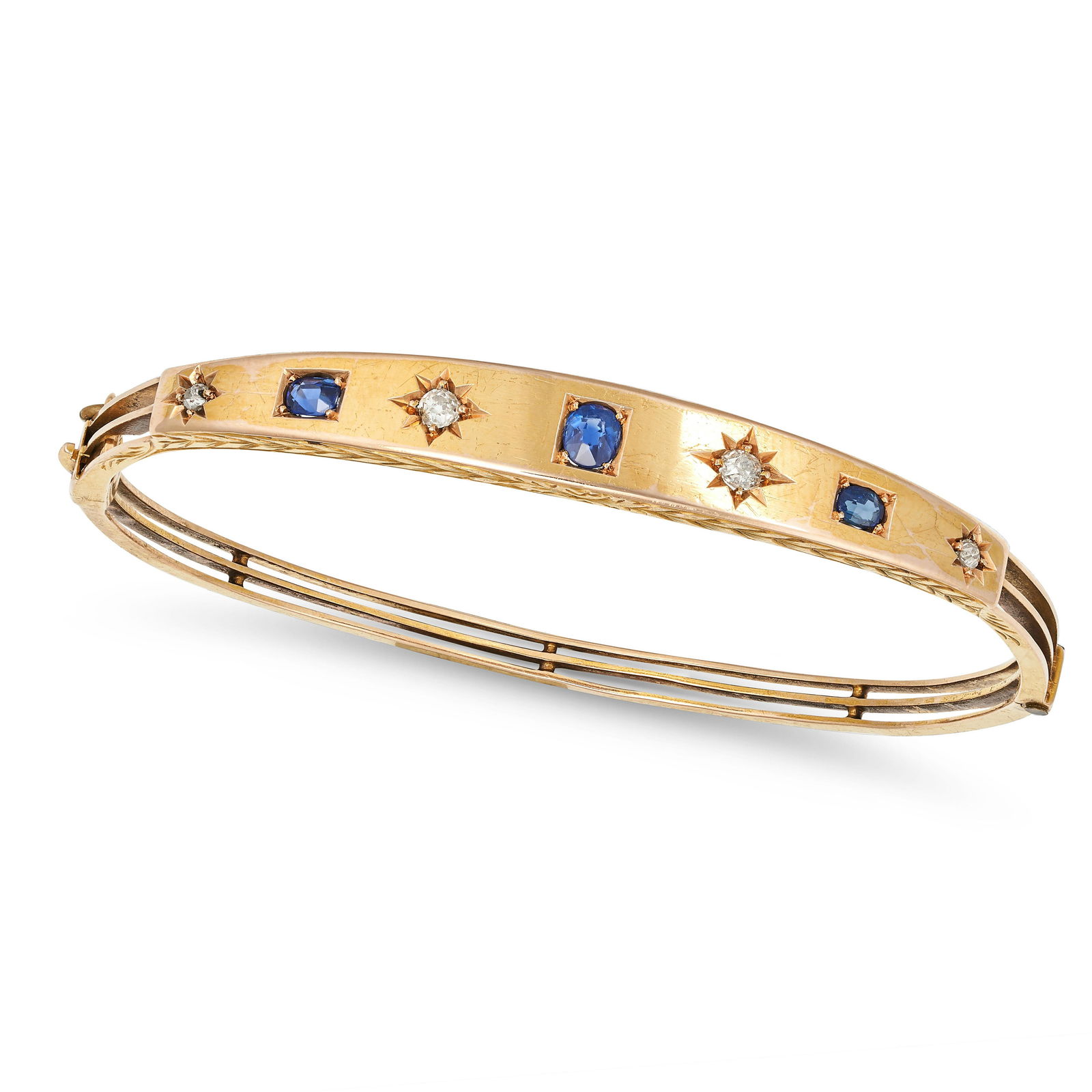 AN ANTIQUE VICTORIAN SAPPHIRE AND DIAMOND BANGLE in 15ct yellow gold, set with a row of alternati... (1 of 1)