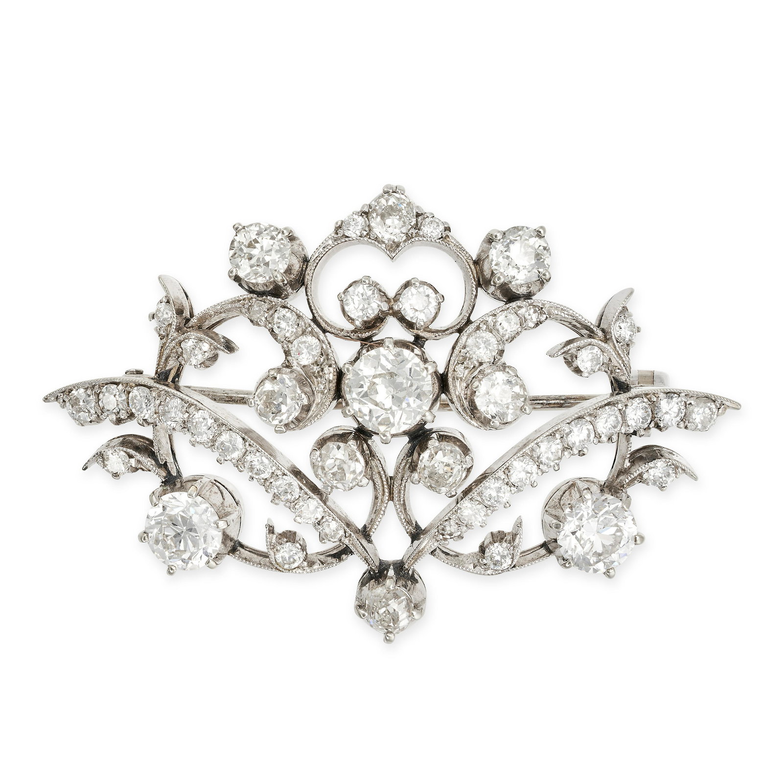 A VINTAGE DIAMOND BROOCH in 18ct white gold, the scrolling body set with old cut diamonds all (1 of 1)