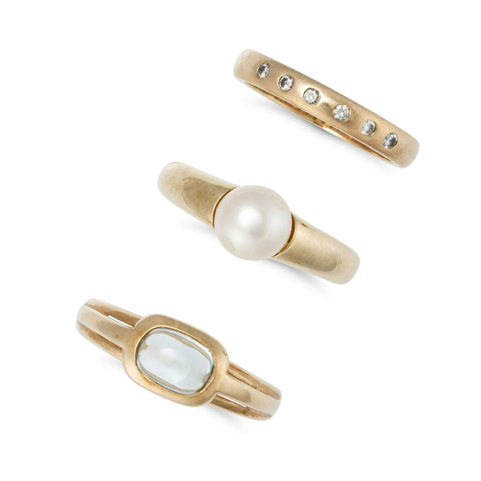 A COLLECTION OF THREE GEMSET RINGS in 9ct yellow gold, comprising a ring set with a cabochon cut (1 of 1)