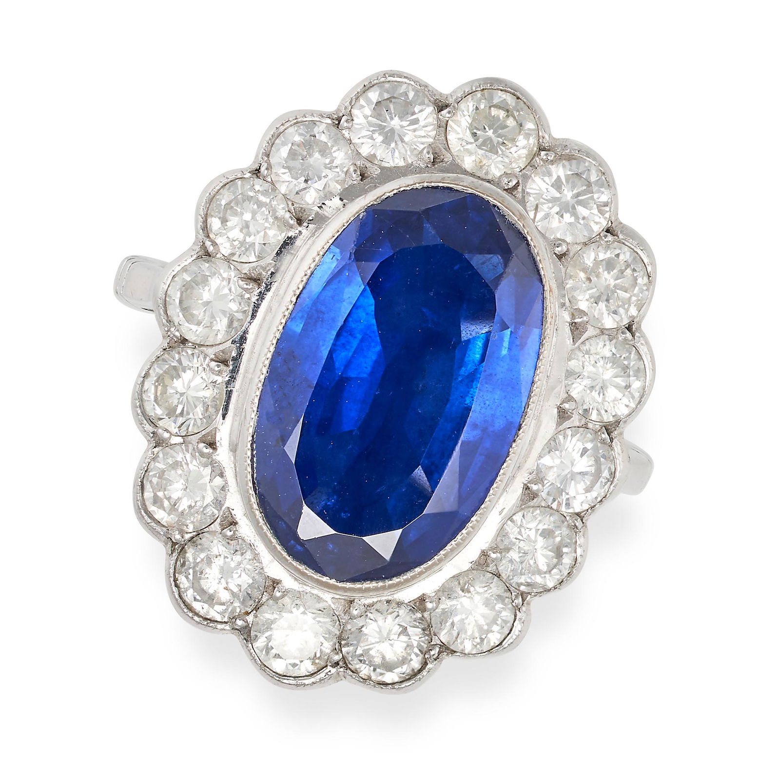 A SAPPHIRE AND DIAMOND CLUSTER RING in 18ct white gold, set with an oval cut sapphire of (1 of 1)