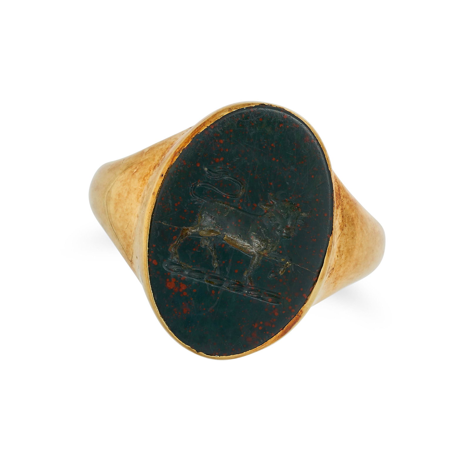 AN ANTIQUE BLOODSTONE INTAGLIO RING in yellow gold, set with an oval bloodstone carved to depict a (1 of 2)