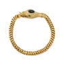 AN ANTIQUE VICTORIAN SAPPHIRE AND EMERALD CHILD'S SNAKE BRACELET in 9ct yellow gold, the head set