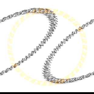 BULGARI, A DIAMOND CURB CHAIN NECKLACE in 18ct yellow gold, comprising a stylised curb chain,: BULGARI, A DIAMOND CURB CHAIN NECKLACE in 18ct yellow gold, comprising a stylised curb chain, accented by sections of round brilliant cut diamonds, the diamonds all totalling 5.5-6.0 carats, signed BV