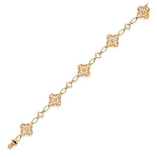 VAN CLEEF & ARPELS, A FINE VINTAGE DIAMOND ALHAMBRA BRACELET, CIRCA 1984 in 18ct yellow gold,: VAN CLEEF & ARPELS, A FINE VINTAGE DIAMOND ALHAMBRA BRACELET, CIRCA 1984 in 18ct yellow gold, comprising five quatrefoil links set pave set with diamonds, connected by smaller quatrefoil motifs and st