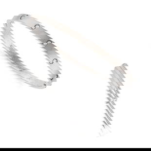 CARTIER, A DIAMOND LOVE BANGLE in 18ct white gold, the screw motifs punctuated by ten round: CARTIER, A DIAMOND LOVE BANGLE in 18ct white gold, the screw motifs punctuated by ten round brilliant cut diamonds, signed Cartier and numbered, stamped Au750, inner circumference 19.0cm, 22.5g. Accom