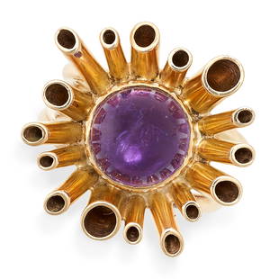 NO RESERVE - A VINTAGE AMETHYST RING in 9ct yellow gold, set with a cabochon amethyst within an: NO RESERVE - A VINTAGE AMETHYST RING in 9ct yellow gold, set with a cabochon amethyst within an abstract tubular border, British hallmarks for London 1971, size N / 6.5, 9.9g.