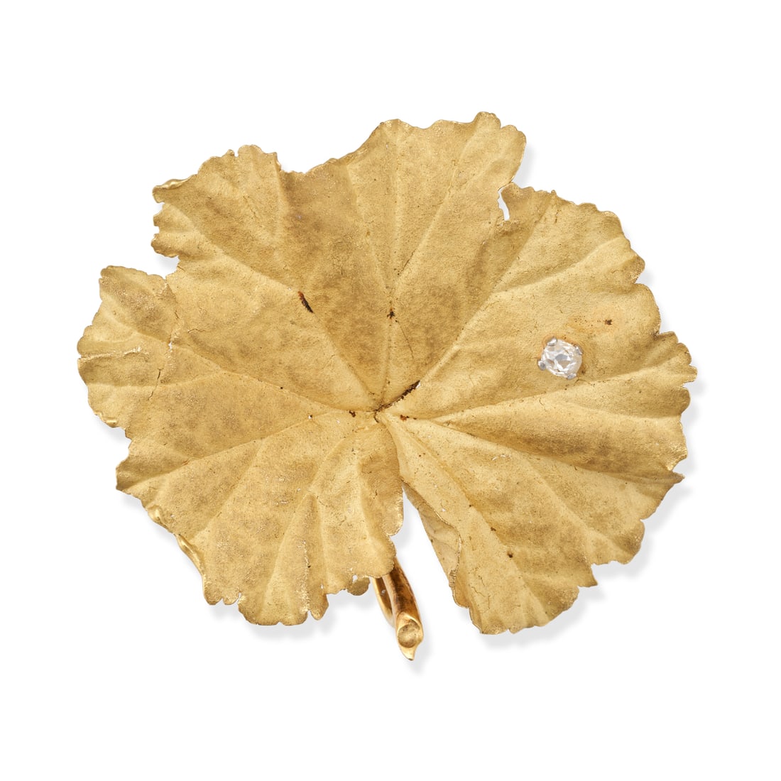 ANDREW GRIMA, A MODERNIST DIAMOND LEAF BROOCH in 18ct yellow gold, designed as a leaf set with an...: ANDREW GRIMA, A MODERNIST DIAMOND LEAF BROOCH in 18ct yellow gold, designed as a leaf set with an old cut diamond, signed GRIMA, full British hallmarks for London 1967, 4.1cm, 7.2g.