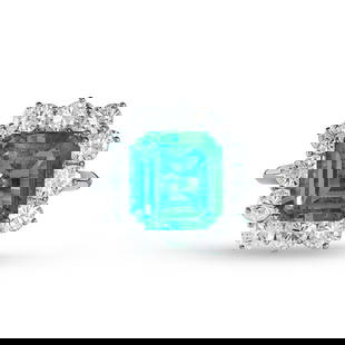 A FINE COLOMBIAN EMERALD AND DIAMOND RING in 18ct white gold, set with an octagonal step cut emerald: A FINE COLOMBIAN EMERALD AND DIAMOND RING in 18ct white gold, set with an octagonal step cut emerald of 6.47 carats in a cluster of round brilliant cut diamonds, the diamonds all totalling 2.40 carats