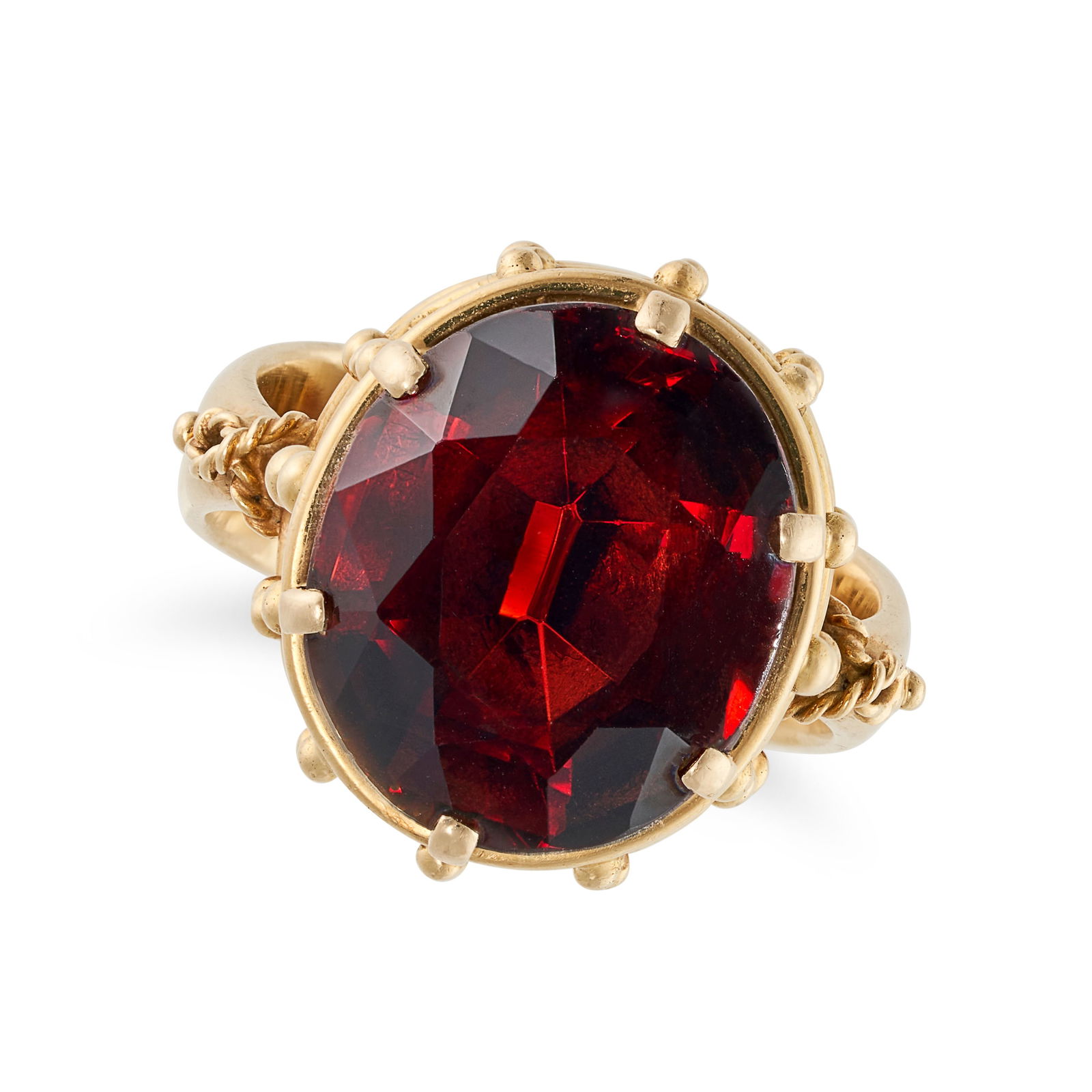 LUCIENNE LAZON, A VINTAGE GARNET RING in 18ct yellow gold, set with an oval cut garnet in a stylised (1 of 1)