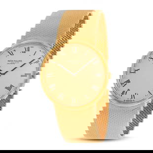 PATEK PHILIPPE - A PATEK PHILIPPE CALATRAVA WRISTWATCH in 18ct yellow gold, 3588/1, thirty six je...: PATEK PHILIPPE - A PATEK PHILIPPE CALATRAVA WRISTWATCH in 18ct yellow gold, 3588/1, thirty six jewel automatic movement, the circular champagne dial with Roman numerals, to a textured mesh strap and c
