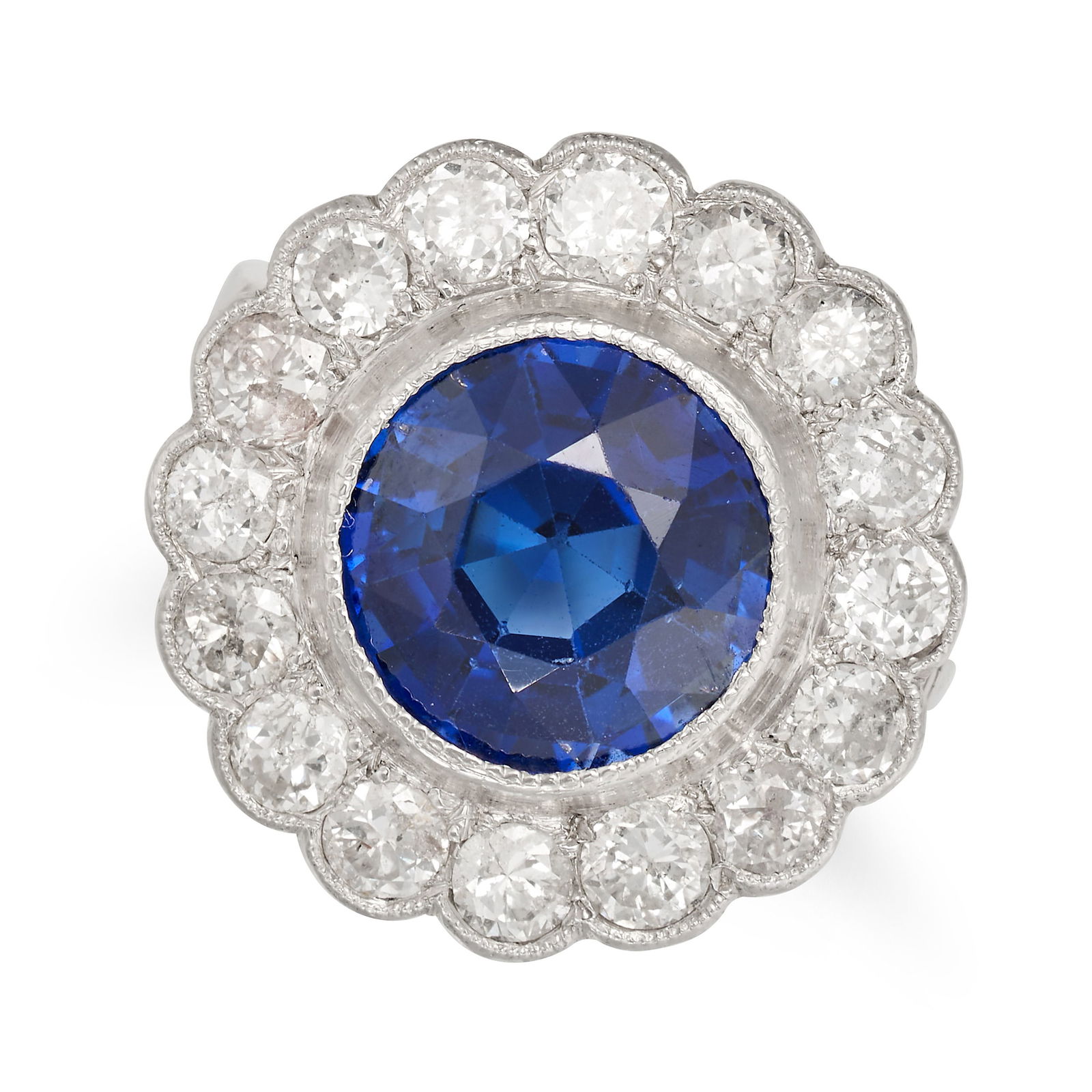 A SYNTHETIC SAPPHIRE AND DIAMOND CLUSTER RING set with a round cut synthetic sapphire in a cluster (1 of 1)