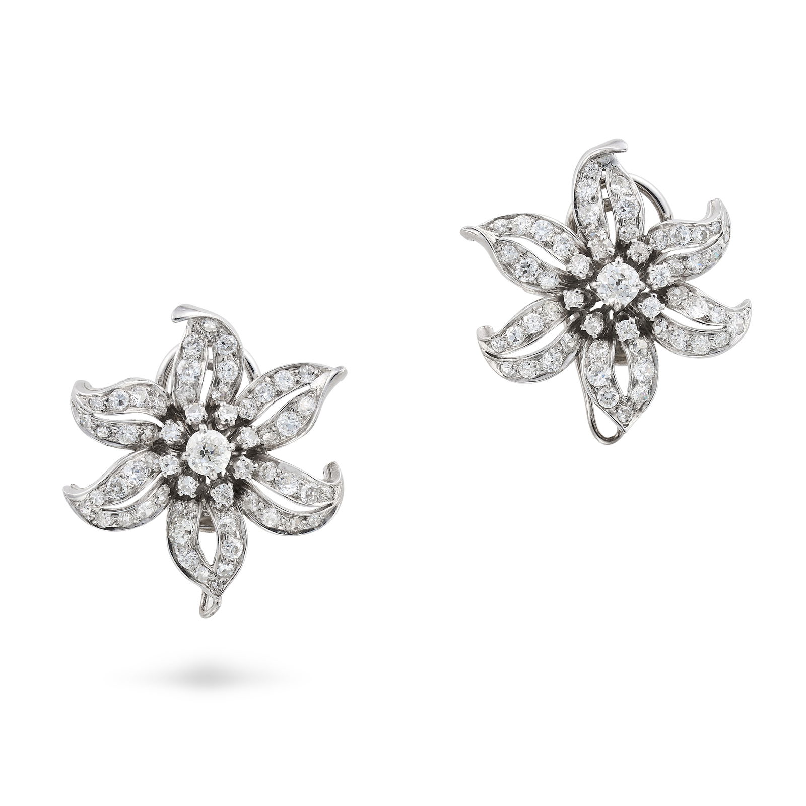 A PAIR OF DIAMOND FLOWER CLIP EARRINGS each set to the centre with an old cut diamond in a cluster (1 of 1)