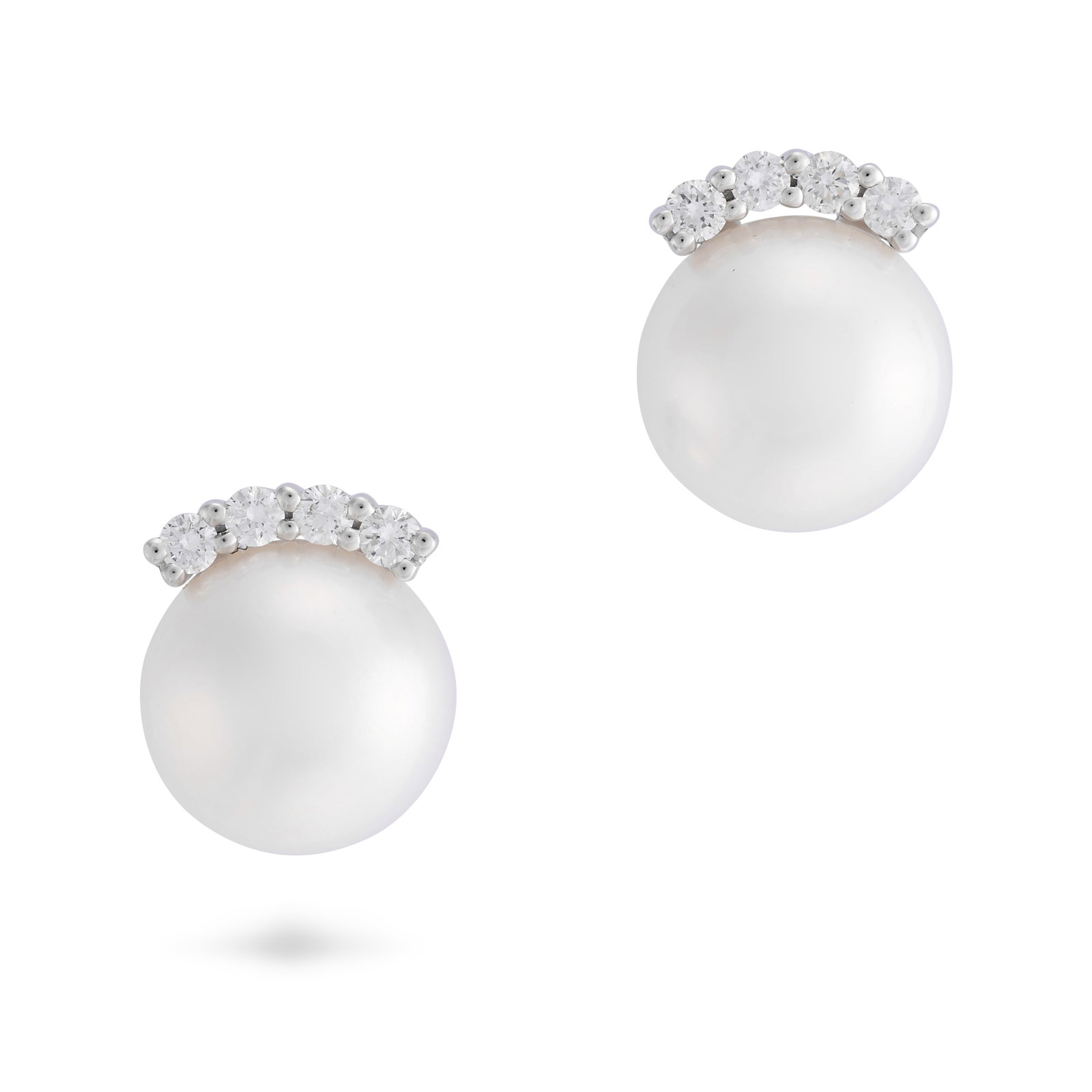 BUCHERER, A PAIR OF PEARL AND DIAMOND STUD EARRINGS in 18ct white gold, each set with a pearl of: BUCHERER, A PAIR OF PEARL AND DIAMOND STUD EARRINGS in 18ct white gold, each set with a pearl of 8.5mm accented by round brilliant cut diamonds, CB maker's mark, Swiss maker's mark, 1.1cm, 4.3g. Accom