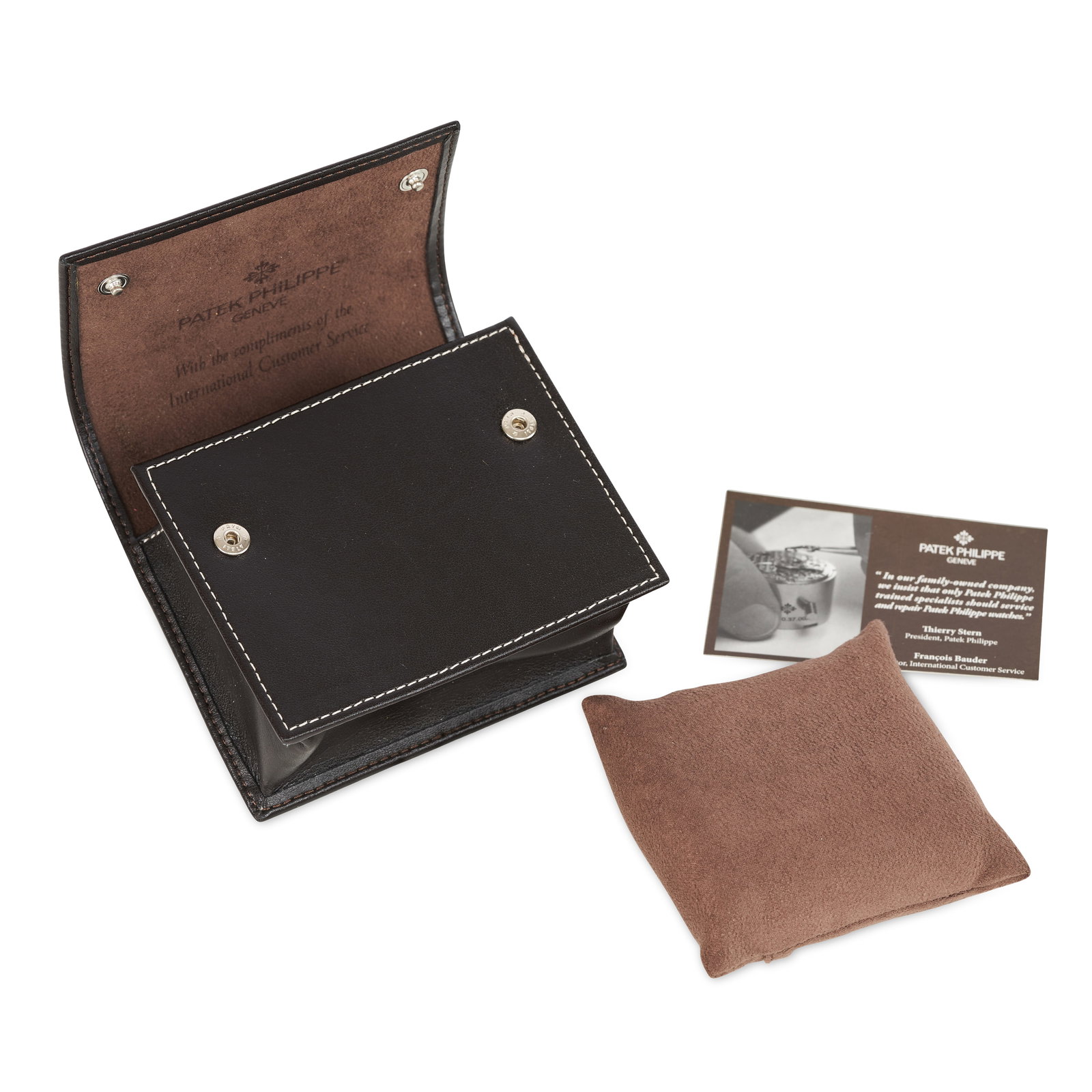 PATEK PHILIPPE - A WATCH SERVICE POUCH, in brown leather with suede inner fabric and cushion,: PATEK PHILIPPE - A WATCH SERVICE POUCH, in brown leather with suede inner fabric and cushion, approximate size 11 x 10.5 x 5cm.