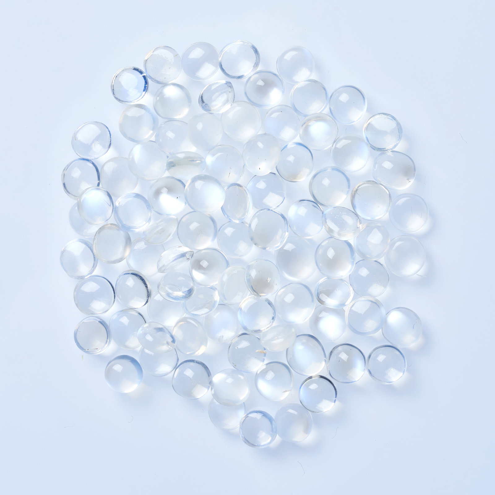 A COLLECTION OF UNMOUNTED MOONSTONES round cabochon, all totalling 64.00 carats.: A COLLECTION OF UNMOUNTED MOONSTONES round cabochon, all totalling 64.00 carats.