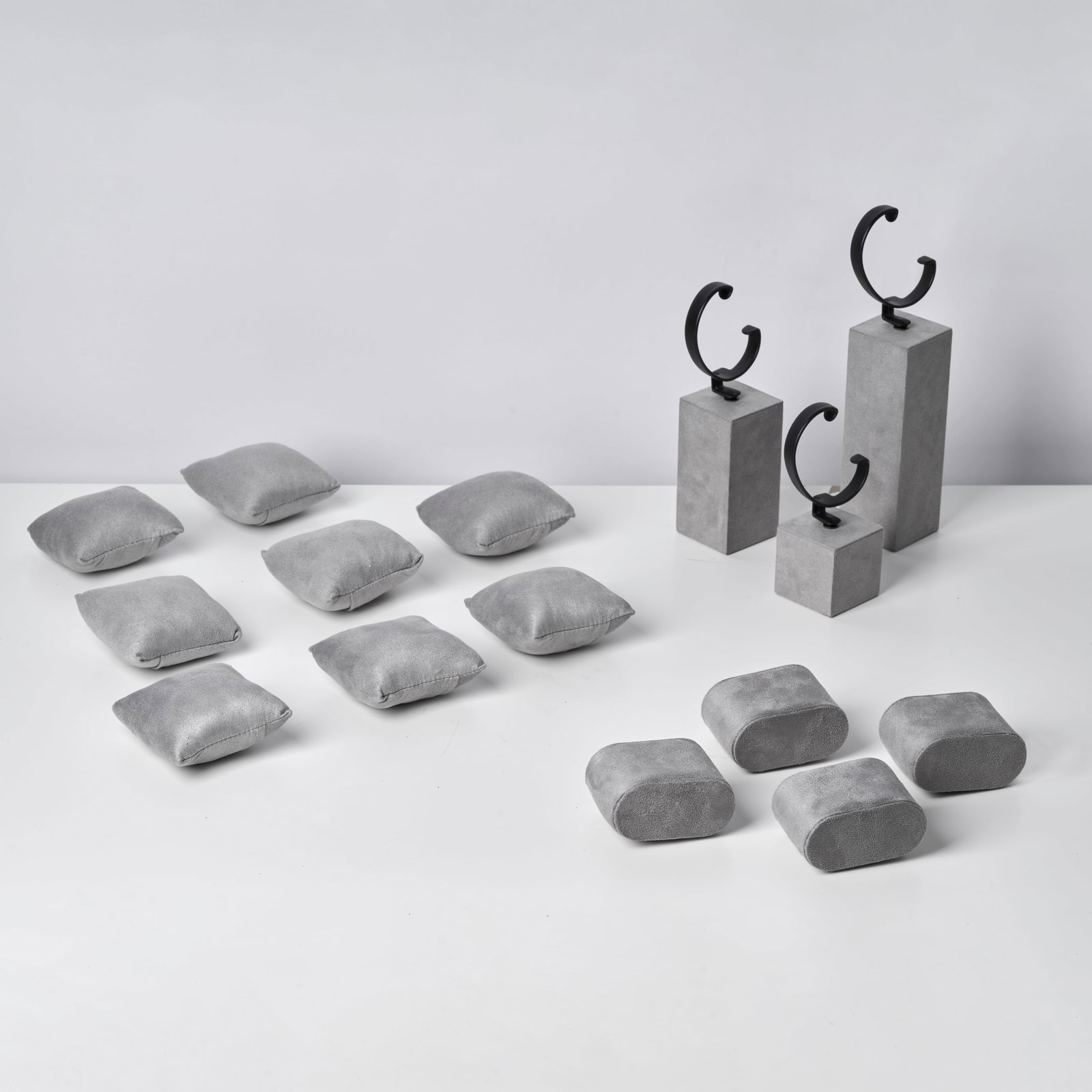NO RESERVE - A COLLECTION OF WATCH DISPLAYS comprising cushion pads and stands.: NO RESERVE - A COLLECTION OF WATCH DISPLAYS comprising cushion pads and stands.