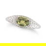 KAT FLORENCE, A RUSSIAN DEMANTOID GARNET AND DIAMOND DRESS RING set with an oval cut demantoid