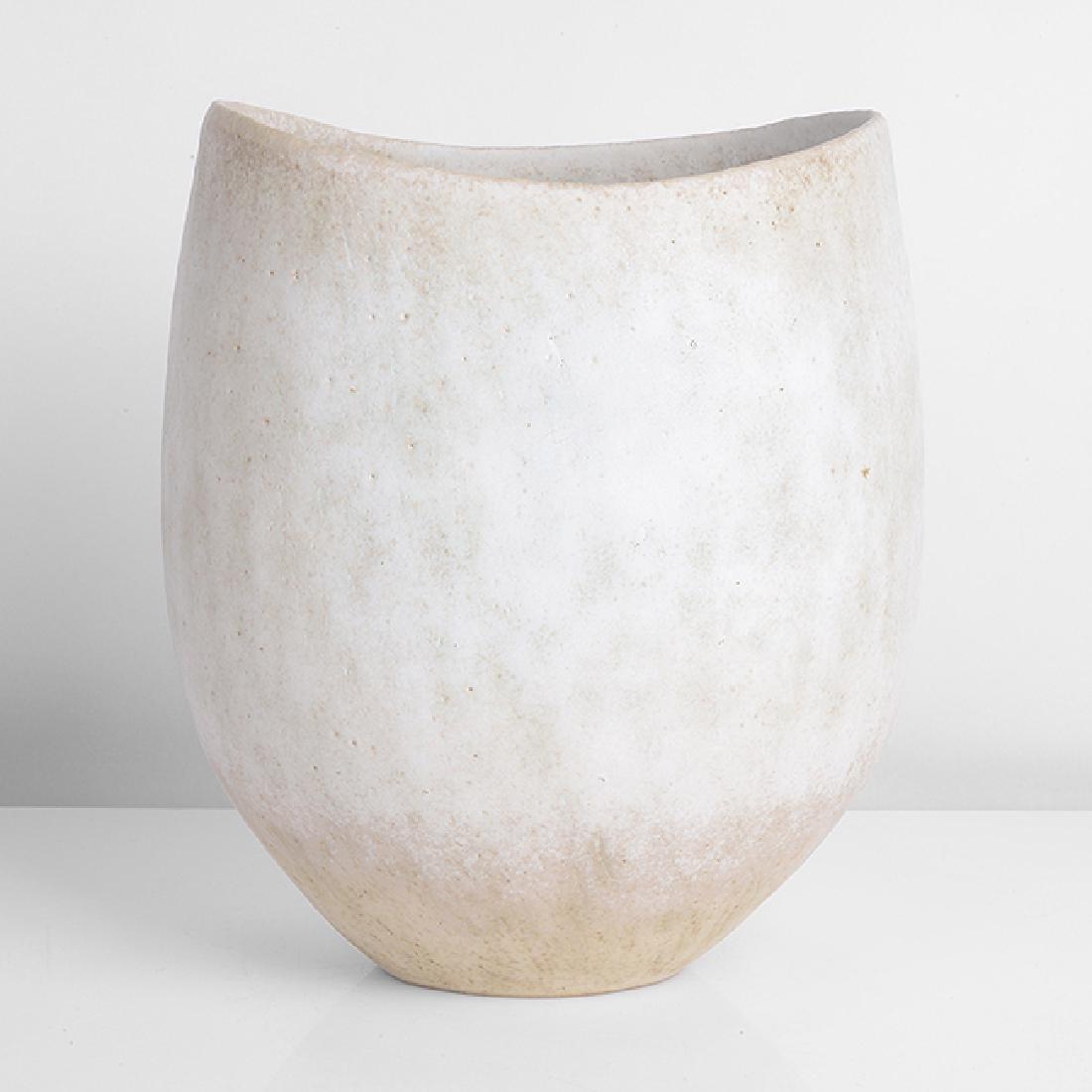 John Ward (British, b.1938): Vessel with Dipped Rim, circa 1994 Stoneware, pale mottled green and white glaze with subtle white band around the undulating rim, impressed JW seal H 17.9cm, W 15.3cm, D 12.2cm PROVENANCE: Private Co