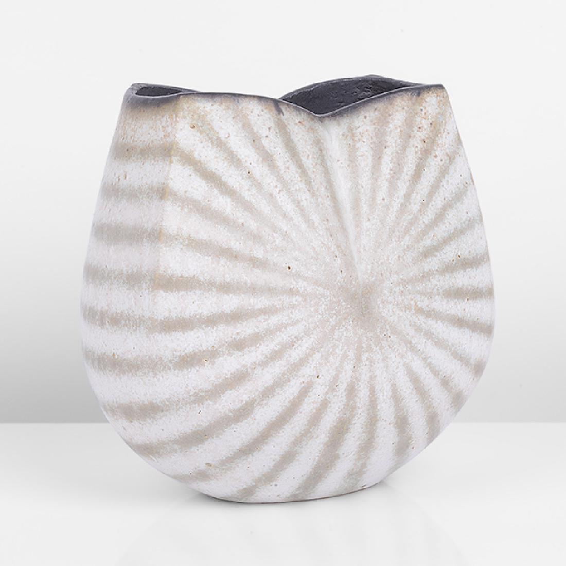 John Ward (British, b.1938): Small Vessel, circa 1990 Stoneware, matt white glaze with radiating green lines from central point on each side, matt black glazed interior, the rounded body rising and shaped to four corners at the r