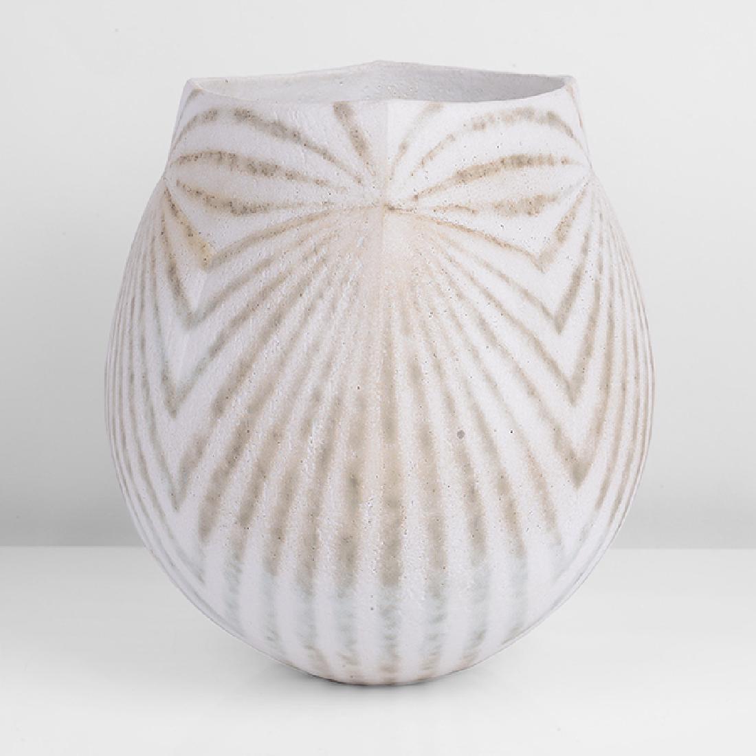 John Ward (British, b.1938): Vessel with squared Collar, circa 1995 Stoneware, matt white glaze with green zigzag lines following the contours of the form, the rounded form squared at the shoulder, with inverted vertical line to