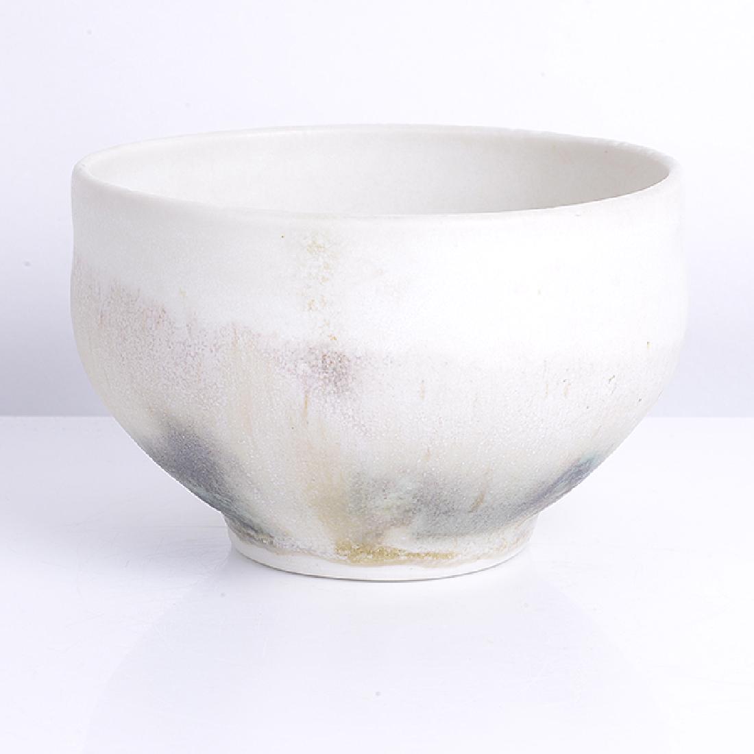 Toshiko Takaezu (Japanese, 1922-2011) Tea Bowl: Toshiko Takaezu (Japanese, 1922-2011) Tea Bowl Porcelain, layered running green and purple over white mottled glazes, impressed maker's mark H 6.9cm, D 11.4cm PROVENANCE: Lacoste/Keane Gallery, Massac