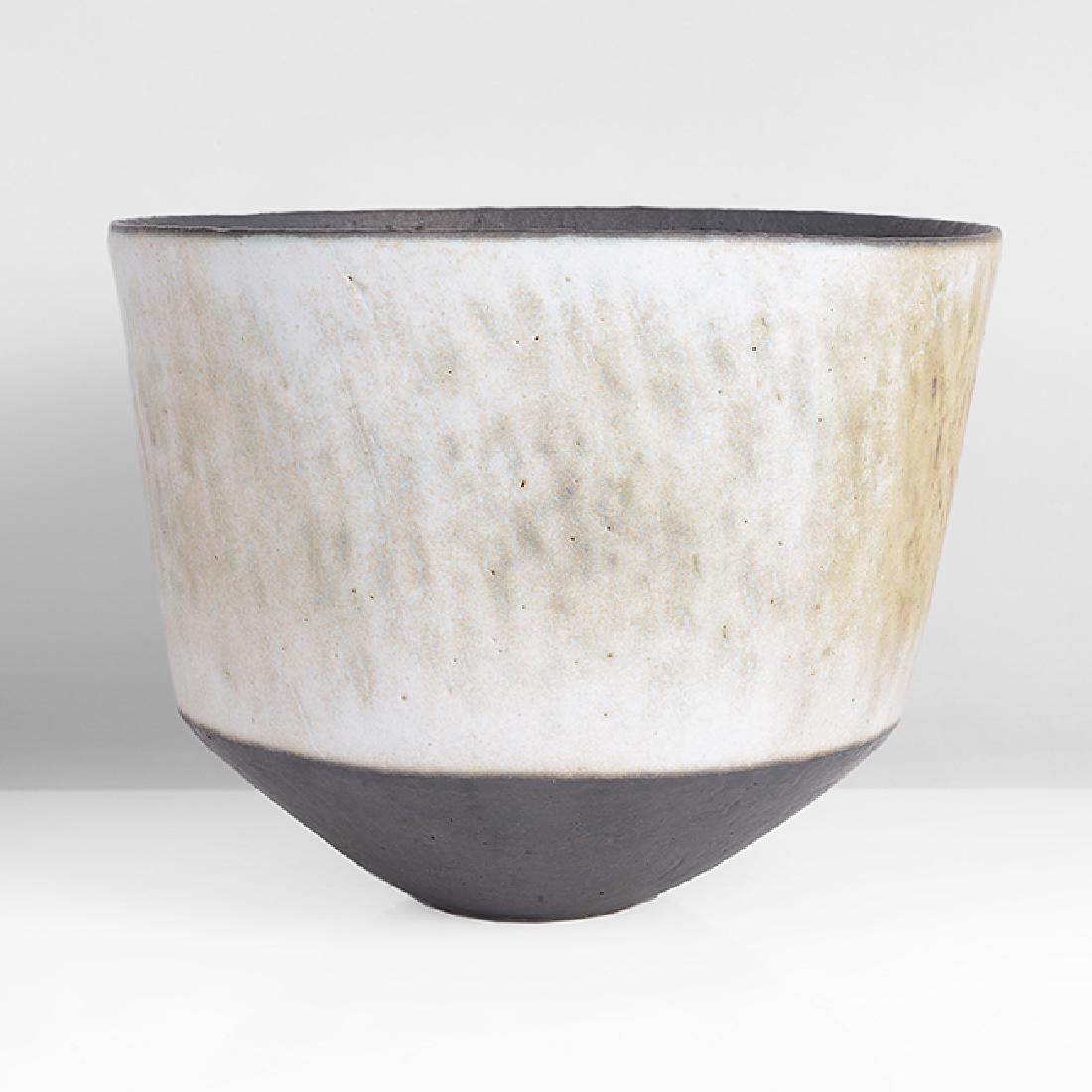 John Ward (British, 1938) Open Vessel, circa 1990: John Ward (British, 1938) Open Vessel, circa 1990 Stoneware, mottled green and white glazed body with flecks of blue, black glazed angled foot and a dry black glaze to textured interior, impressed JW