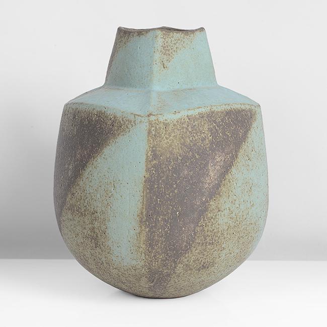 John Ward (British, 1938) Pot with Squared Collar,: Stoneware, mottled green and brown glazes, a dark brown diagonal design to each face of the gently squared body, the flattened shoulder with raised rib at each corner, rising to a squared neck, impres