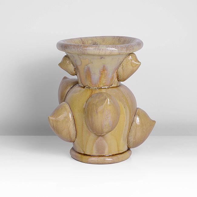 Kate Malone (British, b.1959) 'Garlic Bud Vase', 2001: Stoneware, mottled golden crystalline glaze, the baluster body applied with naturalistic buds forms, incised signature Dimensions: H 20.1cm, D 17.4cm Notes: PROVENANCE: Adrian Sassoon, London To place