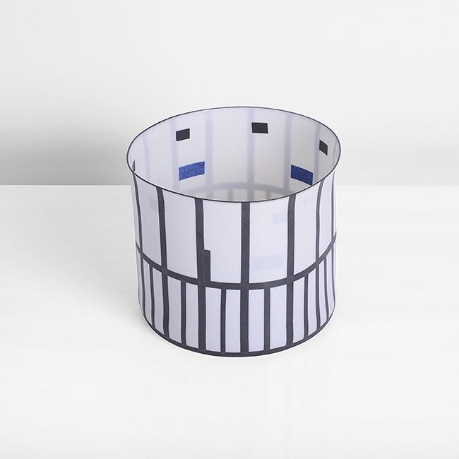 Bodil Manz (Danish, b.1943): Large Cylinder, 2013 Porcelain, white glazed body with geometric blocks and lines in black and dark blue, painted signature and date