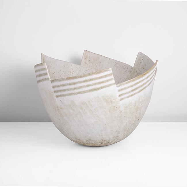 John Ward (British, b. 1938): Open Bowl with Cut Rim Stoneware, mottled white and green glaze to a pitted and softly textured body with a diagonal green and white linear pattern following the contours of the cut rim, impressed JM