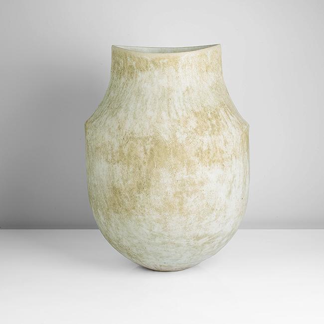 John Ward (British, b. 1938): Monumental Shouldered Vessel, circa 1995 Stoneware, mottled white, brown and very pale green glazes over a lightly textured and softly pitted surface, the tall globular form with pointed shoulders ris