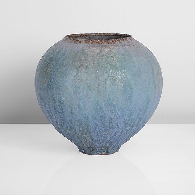 Peter Beard (British, b.1951): Small Pot, circa 1985 Stoneware, layered running glazes in turquoise and blue over a textured surface, pale brown glaze around the pinched irregular rim, impressed PFB seal