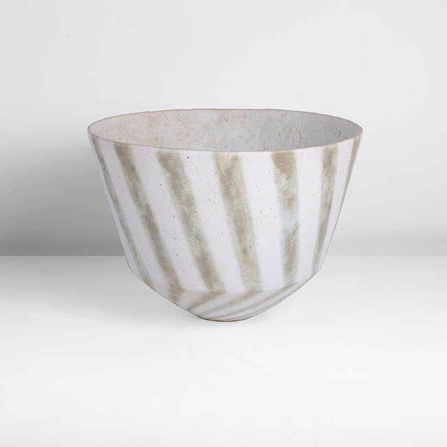 John Ward (British, b.1938): Open Bowl, 1985 Stoneware, matt white glaze with mottled green diagonal linear design, mottled white and green interior, impressed JW seal H 16.4cm, D 23.1cm PROVENANCE: The Chestnut Gallery Collectio