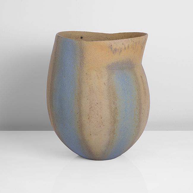 John Ward (British, b.1938): Vessel with Angled Rim, 1991 Stoneware, alternating vertical bands of mottled blue, brown and ochre glazes, impressed JW seal H 23.4cm, D 19.2cm PROVENANCE: The Chestnut Gallery Collection. Peter Ding