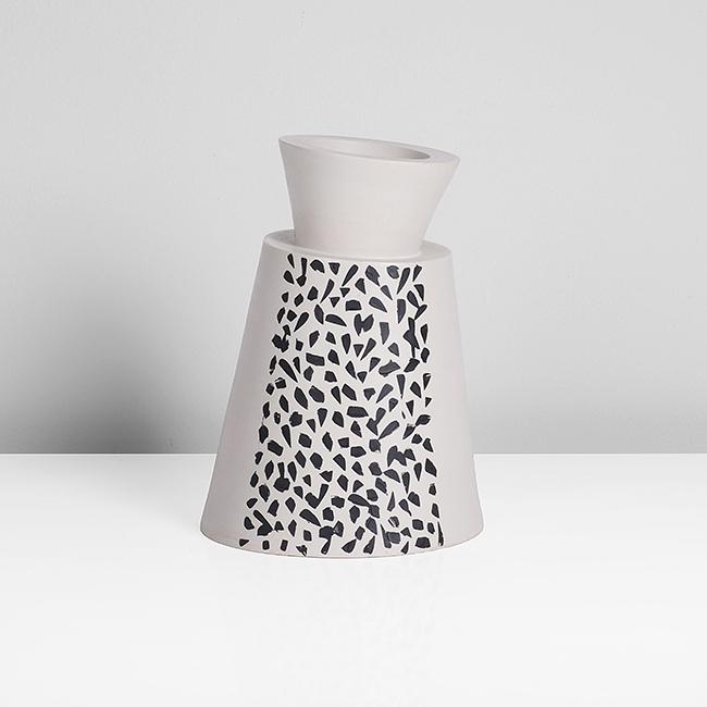 Felicity Aylieff (British, b.1954): Asymmetric Vessel White earthenware, the unglazed white body with two sectional areas of black aggregates to body and collar, incised signature H 15.5cm, D 11.1cm PROVENANCE: Acquired from Contemporar