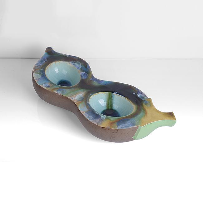 Kate Malone(British, b.1959): Large Seed Pod, circa 1995 Stoneware, double walled vessel with twin wells, glassy turquoise glaze gathering in each well, the flattened rim with blue, green, and brown crystalline glazes, incised sig