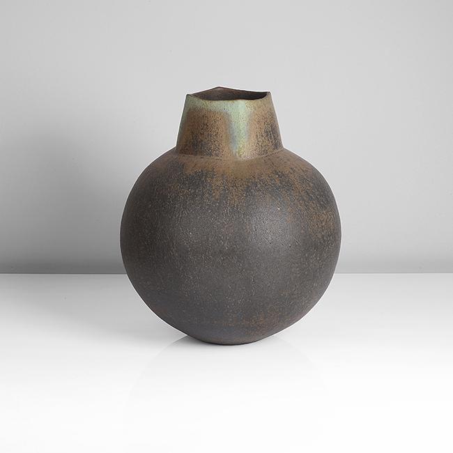 John Ward (British, b.1938): Globular Vessel, circa 1988 Stoneware, dark and pale brown glazes, the squared collar with vivid green glaze running from the rim down the collar on each corner, impressed JW seal Dimensions: 33.2cm,
