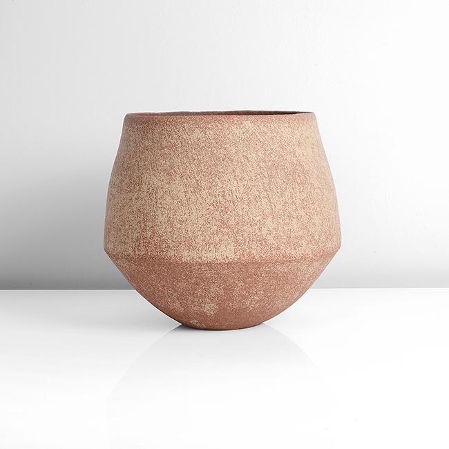 John Ward (British, b.1938): Angled Vessel, circa 1985 Stoneware, mottled cream and burnt orange glazes to the exterior, the interior with mottled pale blue and burnt orange glazes, impressed JW seal DIMENSIONS: H 21.4cm, D 23.9c