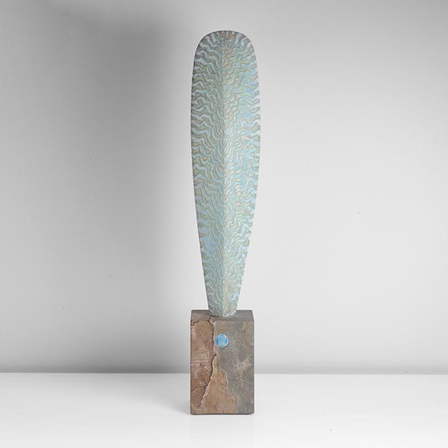 Peter Beard (British, b.1951): Large Sail Form Stoneware, mottled green, blue and pink glazes in undulating diagonal lines, mounted on a stone base with a metal pin, maker's mark on the base DIMENSIONS: Incl. base H 87cm, W 14.2cm,