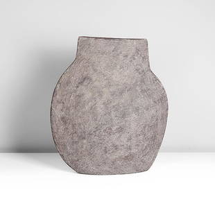 Paul Philp (British, b.1941): Flattened Vessel, circa 2016 Stoneware, mottled grey, mauve and greyish blue glazes over a textured surface, impressed maker's mark DIMENSIONS: H 38.2cm, W 32.9cm, D 6.6cm PROVENANCE: Private Collecti
