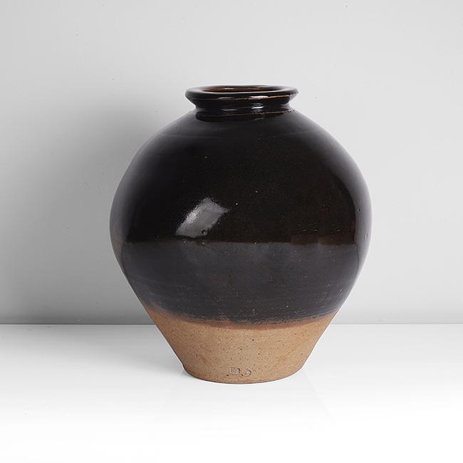 Bernard Leach (British, 1887-1979): Globular Jar, circa 1960 Stoneware, layered rich tenmoku over iron glazes, impressed BL and Leach Pottery seals Dimensions: H 31cm, D 29.4cm PROVENANCE: Dr John P Driscoll Collection All bidding must
