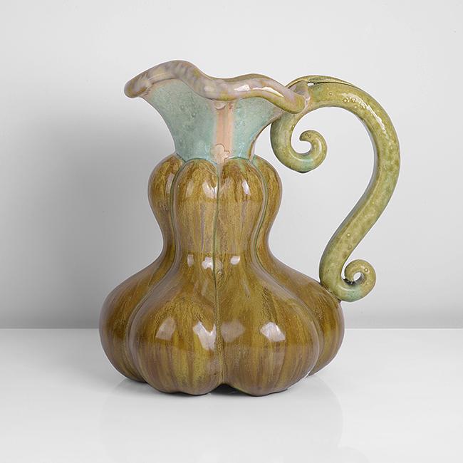 Kate Malone (British, b.1959): Large Gourd Jug Stoneware, layered golden crystalline, green and turquoise glazes with flashes of pink, running down over the naturalistic body and into the flared neck Dimensions: H 31.4cm, W 26.2cm,